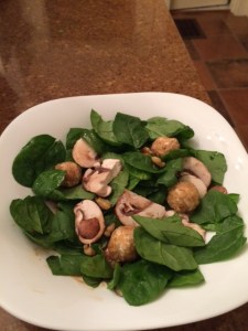 Spinach salad with walnut-encrusted goat cheese